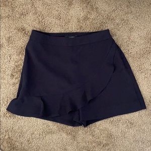 Navy Express shorts with flowing overlay